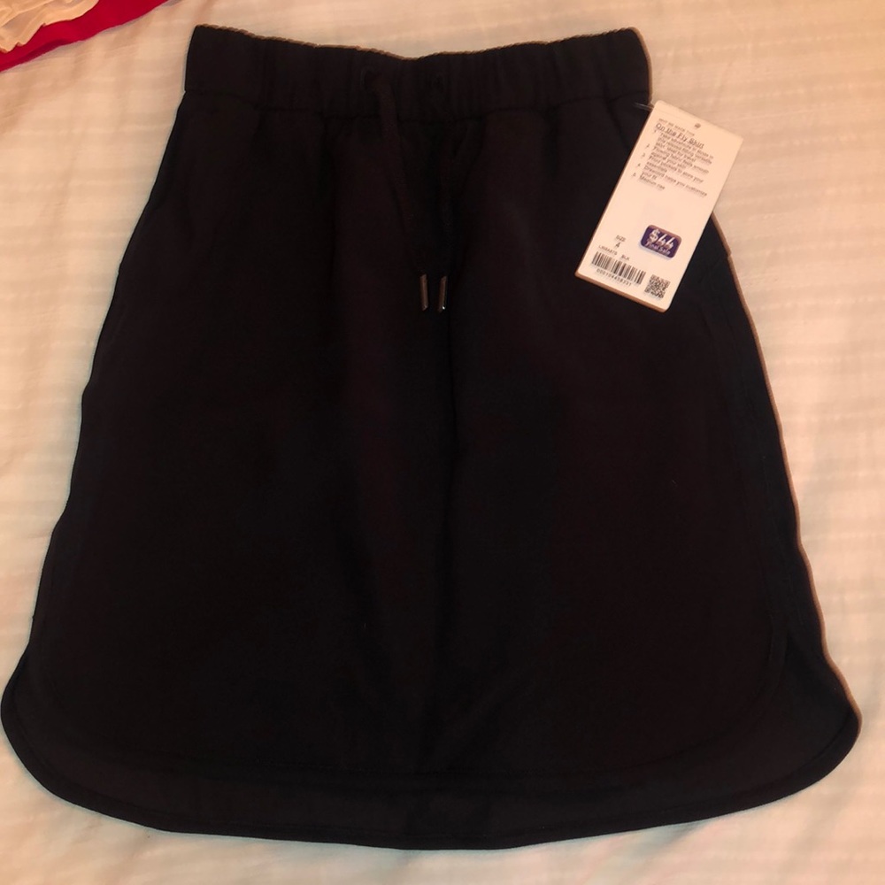 Black lululemon on the fly skirt